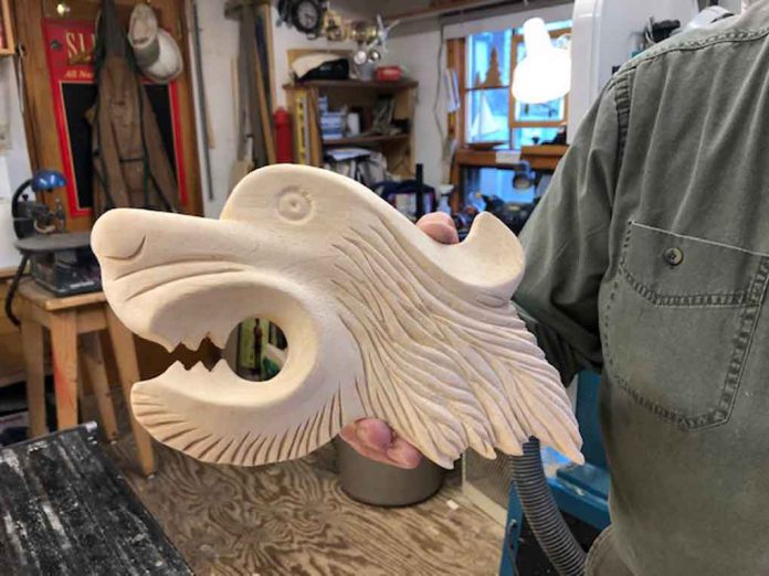 Terry Hurtig of the Thunder Bay Carvers shows off some of the work