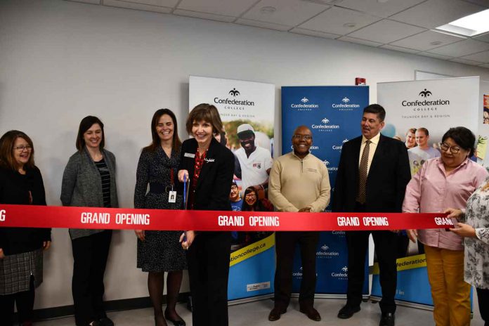 President Kathleen Lynch leads the ribbon cutting to mark the official Grand Opening of the Sioux Lookout Campus