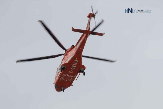 The Ornge Medical Evacuation helicopter taking off from the Thunder Bay Regional Health Sciences Centre