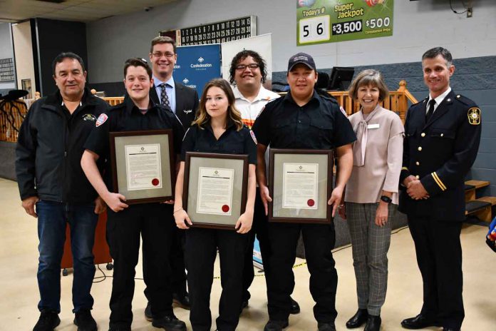 Three Confederation College Pre-Service Firefighter graduates received recognition for heroism from the Ontario Fire Marshal Saturday. From left: · Chief Peter Collins, Fort William First Nation · Riley Tucker, Recipient · Shane Strickland, Dean, School of Health, Negahneewin and Community Services, Confederation College · Taya Stamler, Recipient · William Solomon, Volunteer Fire Service Lead, Fort William First Nation · Devon Wanakamik, Recipient · Kathleen Lynch, President, Confederation College · Tim Beebe, Northern Training Officer, Office of the Ontario Fire Marshal and Emergency Management