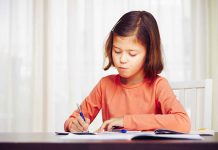 Get A Deeper Understanding Of Core Subjects With The Best Homework Help Site Little girl is doing her homework for elementary school.