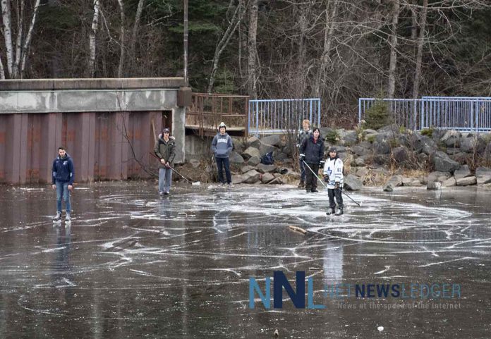 Skaters at Lakehead University enjoying the ice on Lake Tamblyn.