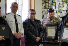 Commissioner’s Commendations Received Following Life-Saving Rescue (left to right): P/C Jean DUGUAY, S/Sgt Karl DUEWEL, Chief Brennan SAINNAWAP, Dwayne BROWN, and Band Councillor Clifford BEARDY.