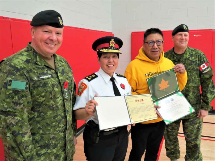 From left, Brigadier-General Conrad Mialkowski, Chief Sylvie Hauth, Grand Chief Alvin Fiddler, and Lieutenant-Colonel Shane McArthur with the army commendations presented to the Thunder Bay Police. - Credit Sergeant Peter Moon, Canadian Rangers