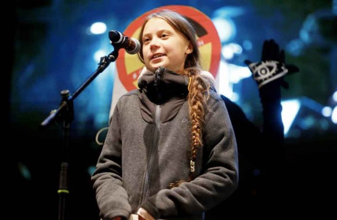 Climate change activist Greta Thunberg delivers a speech at a climate change protest march, as COP25 climate summit is held in Madrid, Spain, December 6, 2019. REUTERS/Javier Barbancho