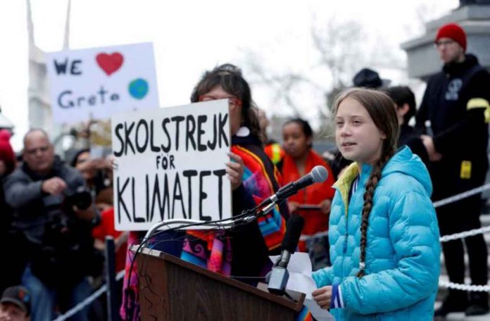 Swedish climate change teen activist Greta Thunberg speaks during a climate strike at the Alberta Legislature in Edmonton, Alberta, Canada October 18, 2019. REUTERS/Amber Bracken/File Photo
