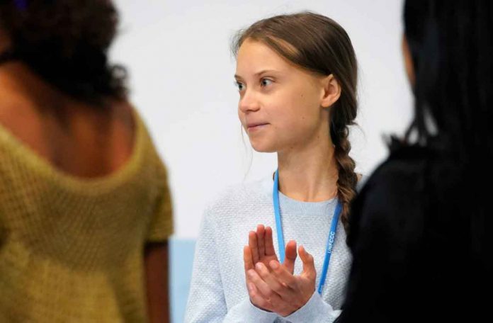 Climate change activist Greta Thunberg attends a news conference during COP25 climate summit in Madrid, Spain, December 9, 2019. REUTERS/Juan Medina