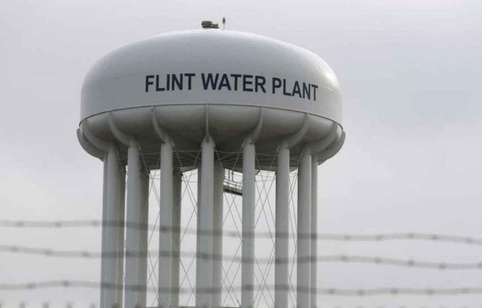 ARCHIVE PHOTO: The Flint Water Plant tower is seen in Flint, Michigan, U.S. on February 7, 2016. REUTERS/Rebecca Cook/File Photo