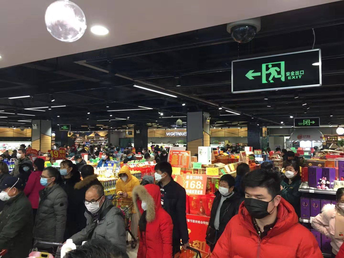 Shoppers a week ago at Wushang Market. Its a stote similar to a Walmart but on a smaller scale.