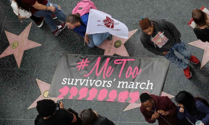 Women take part in a #MeToo protest march for survivors of sexual assault and their supporters in Hollywood, Los Angeles, California U.S. November 12, 2017. REUTERS/Lucy Nicholson