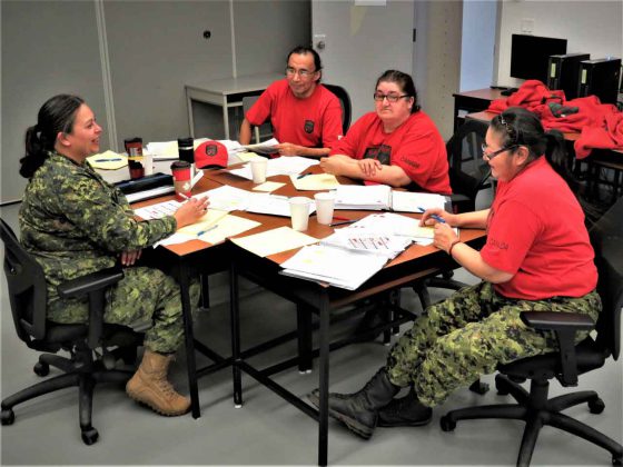 Sergeant Eva Clarke, an army instructor, left, leads a discussion with, from left, Master Corporals Floyd Fiddler from Sandy Lake, Linda Kanate from North Caribou Lake, and Kathleen Beardy from Muskrat Dam.