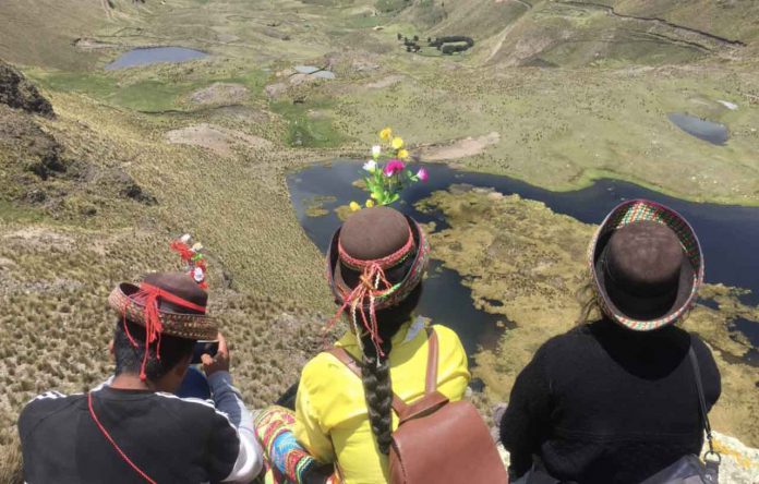 Visitors look at one of the artificial lagoons built near Ayacucho, Perú, January 30, 2020. Thomson Reuters Foundation/Sebastian Rodriguez