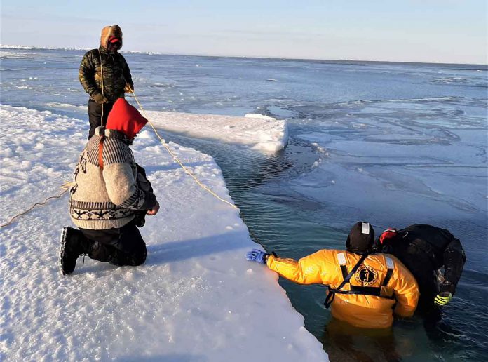 Canadian Rangers practice ice water rescue in an open water section of James Bay. credit Lieutenant-Colonel Shane McArthur, Canadian Rangers