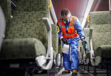 What is extreme cleaning? A crew member cleans a GO bus. At least 40 buses are being specially cleaned each day. (Metrolinx photo)
