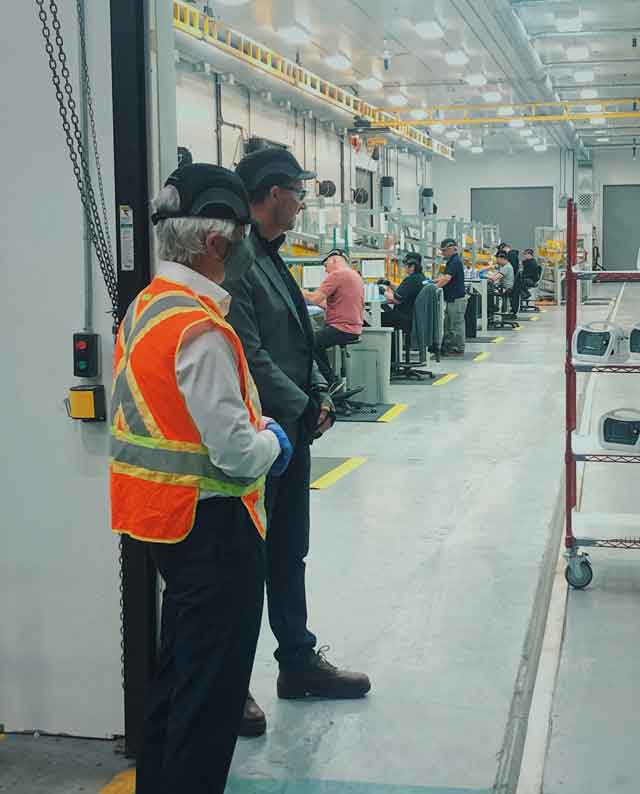 Bombardier plant Manager Don Black with Marcus Powlowski MP Thunder Bay-Rainy River at Clean Room