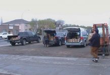 Wild Rice Bounty Shared with Thunder Bay and Northern Communities Social Distancing observed as orders of Wild Rice are divided up