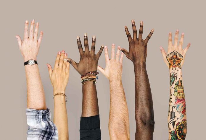 Opinion - Diversity hands raised up gesture