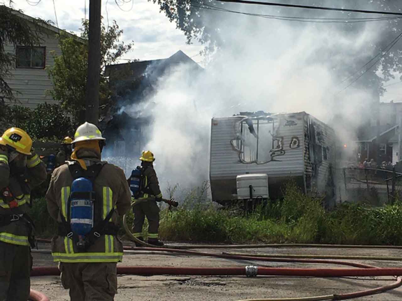 Firefighters put out the blaze on Alberta Street - Image TBFR