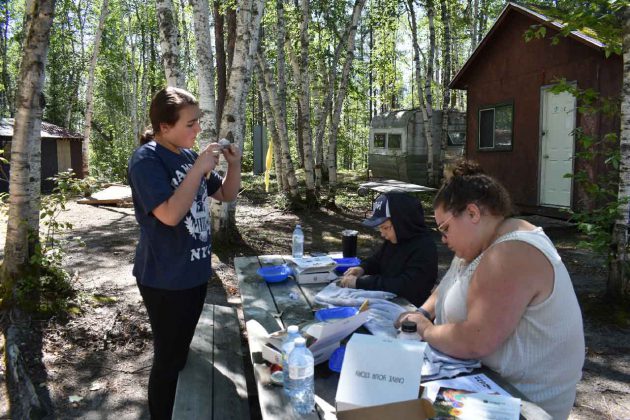 photo by Faye Naveau Smaller groups were a feature of the Wabun Youth Gathering at Dorothy Lake this year. Pictured are from L-R: First Nation youth Madison Batisse and Moses Meaniss with Hunter Lemay, Youth Outreach Worker, Choose Life Program, Beaverhouse First Nation.