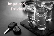 Impaired-Driving-vodka-shot-drink-and-car-key-VDFYXC5