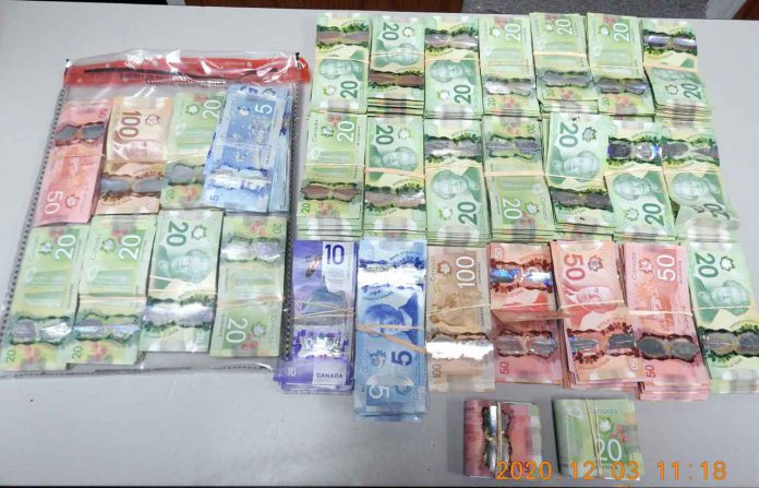 Thunder Bay Police Image - Cash Seized at Cameron Street address