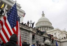 Brendan Hunt aka “X-Ray Ultra” Arrested for Threatening Lives of U.S. Officials Supporters of U.S. President Donald Trump climb on walls at the U.S. Capitol during a protest against the certification of the 2020 U.S. presidential election results by the U.S. Congress, in Washington, U.S., January 6, 2021. REUTERS/Jim Urquhart