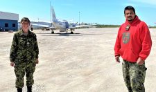 Sergeant Janet Butt, left, at Kashechewan airport with Master Corporal Joe Lazaus of the Canadian Rangers credit  Canadian Rangers