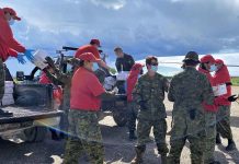 Year of the Canadian Rangers – 75th Anniversary Celebrated Sergeant Janet Butt supervised a joint team of Canadian Rangers and soldiers during the unloading of cargo aircraft at Kashechewan airport. credit Sergeant Janet Butt, Canadian Rangers