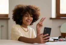 Disconnect to Reconnect: Finding Peace and Togetherness This Holiday Season Woman on smartphone