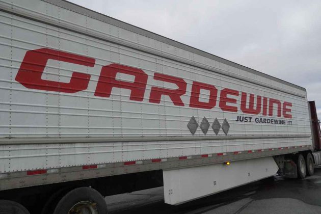 Toys are unloaded and then will be transported by Gardewine to be sorted for Northern communities