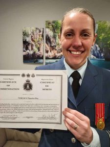 70 Squadron Commanding Officer Captain Kate Yap accepts the commendation from LCol O'Leary, Commanding Officer of RCSU Central, on behalf of the squadron’s cadets and staff.