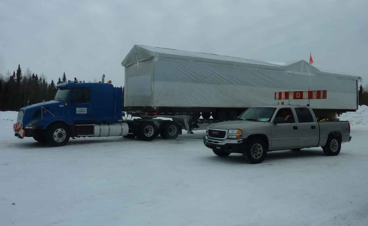 photo by Lawrence Rose Winter ice road building also includes transporting of goods and material. Pictured is a transport owned by Kataquapit Freight Services hauling a prefabricated building destined for Attawapiskat First Nation.