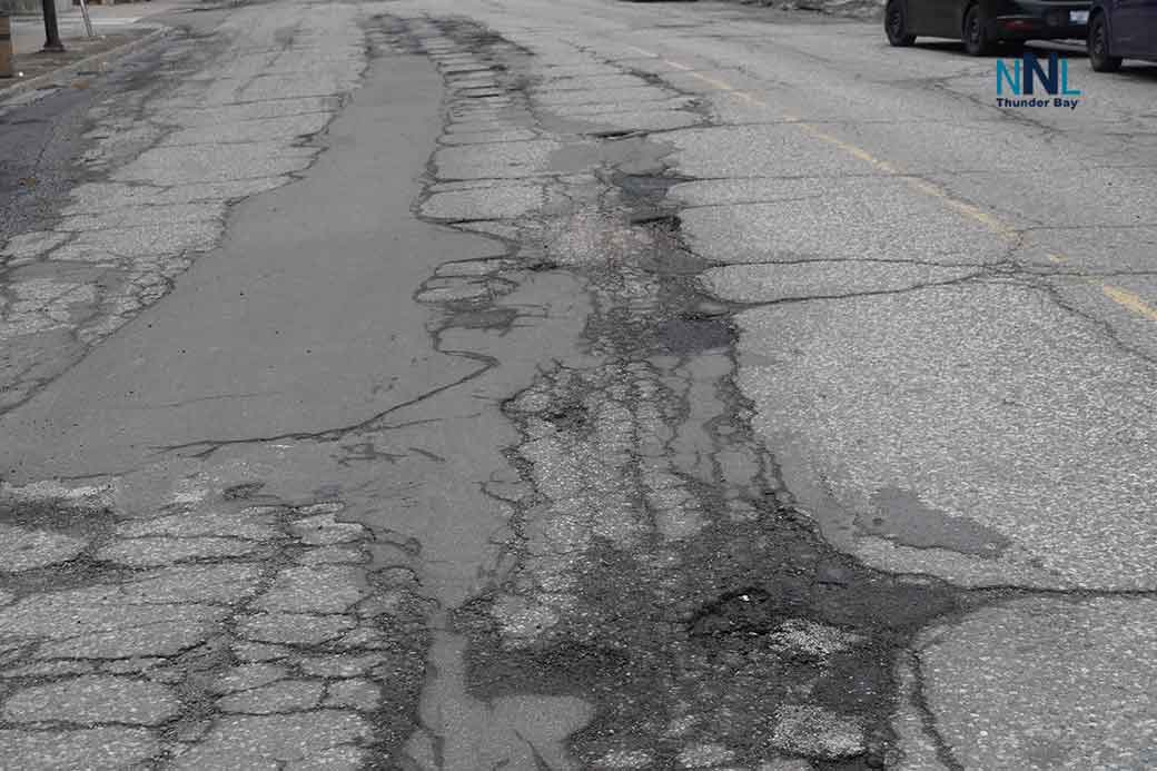 Red River Road in the downtown is one giant mess of potholes