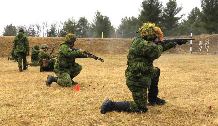 Canadian Rangers fire shotguns at targets on a shooting range. credit Sergeant Peter Moon, Canadian Rangers