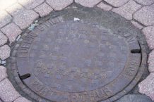 Port Arthur 1969 Manhole Cover in downtown Waterfront District