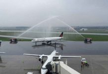 Over 10,000 Air Canada Flight Attendants Edge Closer to Strike as Contract Talks Collapse Water cannon salute for Air Canada Charter