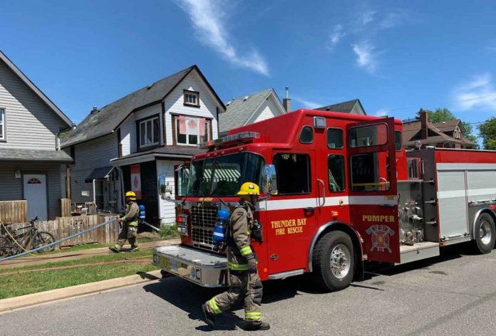 TBFR crews responded at approximately 1:30pm today to an alarm for a report of a “possible” structure fire in the 1200 block of Donald St. E. Upon arrival on scene it was determined that there was a “contents fire” with heavy smoke developing in an apartment unit located on the second floor of the structure. TBFR crews donned self-contained breathing apparatus and immediately advanced an attack line to the second floor unit to conduct quick extinguishment of the fire that was in its early stages and had not yet impacted the overall structural integrity of the building. While fire fighters worked to extinguish the fire, additional TBFR personnel were assigned to ventilate and complete a thorough search of the entire building to make sure all occupants had been accounted for and that there were no injuries to tenants of the structure. Due to the quick response by the crew of Fire Station 1, this fire was brought under control within a short time after their arrival on scene. There were no injuries to occupants or fire fighters at the scene. An on scene investigation of the cause of the fire was completed by the TBFR Officer in Command of the incident. His investigation determined the cause of the fire to be improperly discarded smoking materials. Damage was limited to the apartment of the fire’s origin where renovations were taking place at the time of the fire. No other tenants of the building were displaced as a result of the fire. TBFR responded to this incident with 6 pumpers, 1 aerial ladder truck and a Command unit. Landowners and tenants are reminded to make sure they have working smoke detectors on all levels of an occupied residence and to make sure smoking materials are properly discarded to prevent fires.