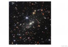 Starting Out in Astronomy: A Guide for Children ASA’s James Webb Space Telescope has produced the deepest and sharpest infrared image of the distant universe to date. Known as Webb’s First Deep Field, this image of galaxy cluster SMACS 0723 is overflowing with detail. Thousands of galaxies – including the faintest objects ever observed in the infrared – have appeared in Webb’s view for the first time. This slice of the vast universe is approximately the size of a grain of sand held at arm’s length by someone on the ground. This deep field, taken by Webb’s Near-Infrared Camera (NIRCam), is a composite made from images at different wavelengths, totaling 12.5 hours – achieving depths at infrared wavelengths beyond the Hubble Space Telescope’s deepest fields, which took weeks. The image shows the galaxy cluster SMACS 0723 as it appeared 4.6 billion years ago. The combined mass of this galaxy cluster acts as a gravitational lens, magnifying much more distant galaxies behind it. Webb’s NIRCam has brought those distant galaxies into sharp focus – they have tiny, faint structures that have never been seen before, including star clusters and diffuse features. Researchers will soon begin to learn more about the galaxies’ masses, ages, histories, and compositions, as Webb seeks the earliest galaxies in the universe. This image is among the telescope’s first-full color images. The full suite will be released Tuesday, July 12, beginning at 10:30 a.m. EDT, during a live NASA TV broadcast.