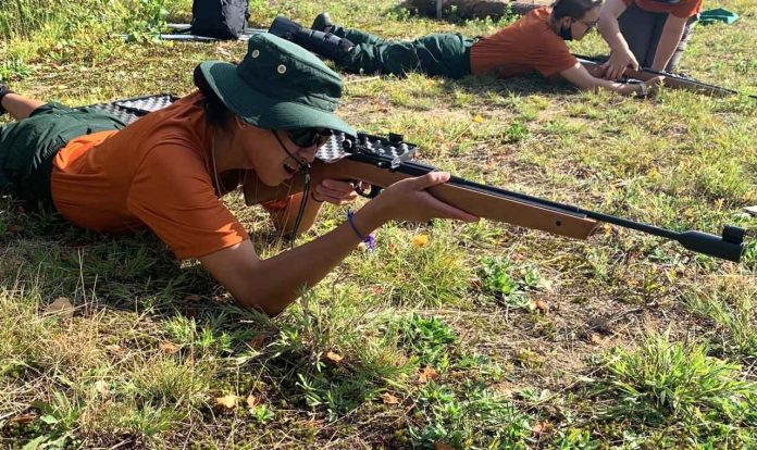 Junior Ranger McCartney Beardy takes aim with an air rifle during a national leadership training course. credit Sergeant Steven Botelho, Canadian Rangers