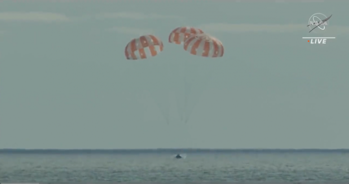 NASA's Orion spacecraft shown splashing down in the Pacific Ocean, west of Baja California, at 9:40 a.m. PST Sunday, Dec. 11. Credits: NASA