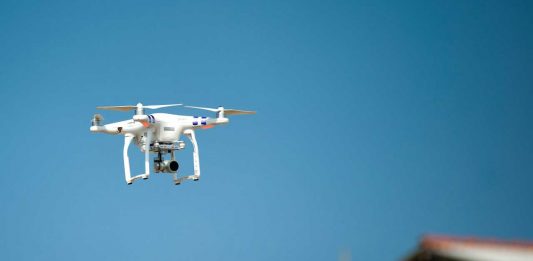 Ontario moves to restrict Chinese-made drones in government and OPP operations Drone flying
