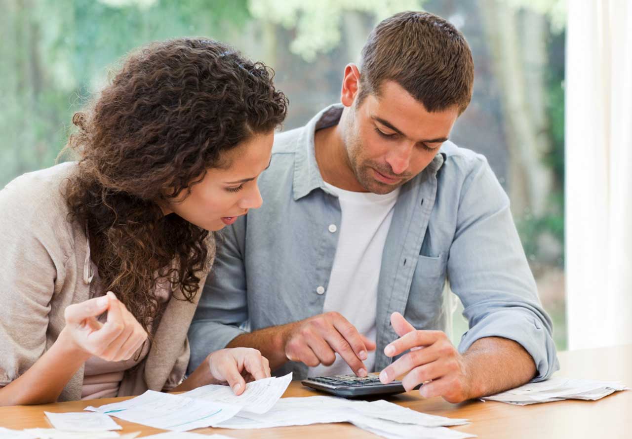 Couple pouring over finances