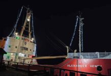WEATHER – Thunder Bay: A Winter Tapestry of Clouds, Flurries, and Clear Skies Alexander Henry alit with Christmas lights