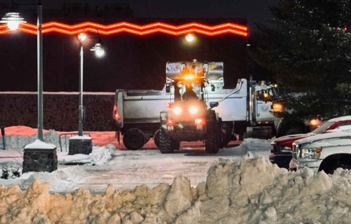The task of clearing the snow from parking lots - Here the OLG Casino parking lot where the mound of snow is being cleared.