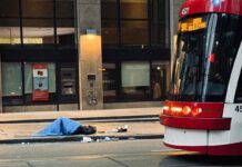 Ontario NDP Announces Homelessness Task Force Homeless Person sleeping on a Toronto Street
