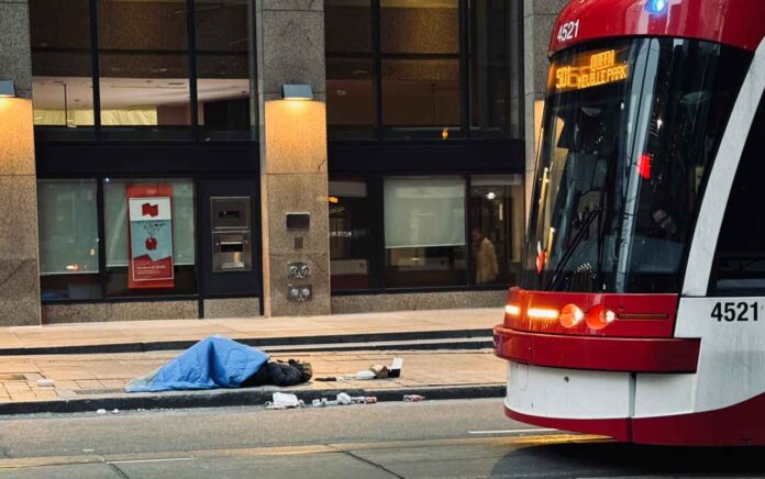 Homeless Person sleeping on a Toronto Street