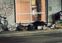 Toronto Expands SafeTO Plan with Stronger Focus on Prevention, Mental Health, and Community Safety Toronto Faces a growing homelessness crisis, this image was captured of a person living under a bridge in downtown Toronto.