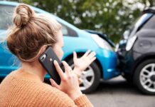 How Long Do You Have to File a Truck Accident Claim in Missouri? Female Motorist Involved In Car Accident Calling Insurance Company Or Recovery Service