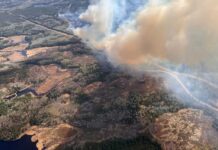 First Nations Leaders Demand Urgent Action on Wildfires Threatening Communities Across Western Canada An aerial view of the Kenora 14 wildland fire, located north of Wabaseemoong Independent Nation. MNR photo