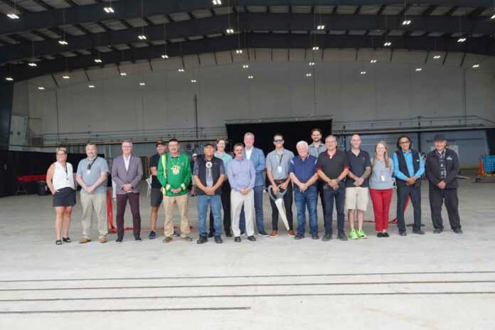 NSA-Hanger-Grand-Opening Just after the Ribbon Cutting the team continues to celebrate the opening!